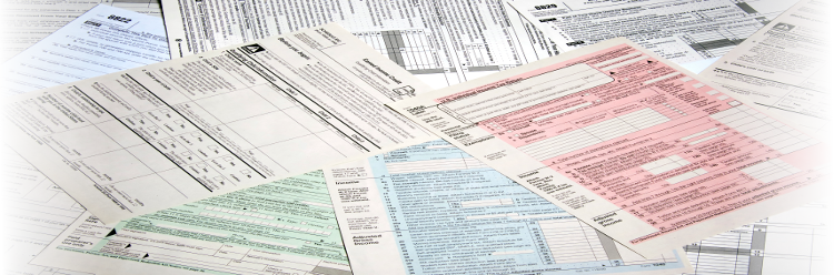 A messy pile of paper invoices on desk. We offer Invoices scanning services in London and throughout the UK. Every financial depart in London and across the UK can work more efficiently with digital invoices and securely store invoices in digital storage with us